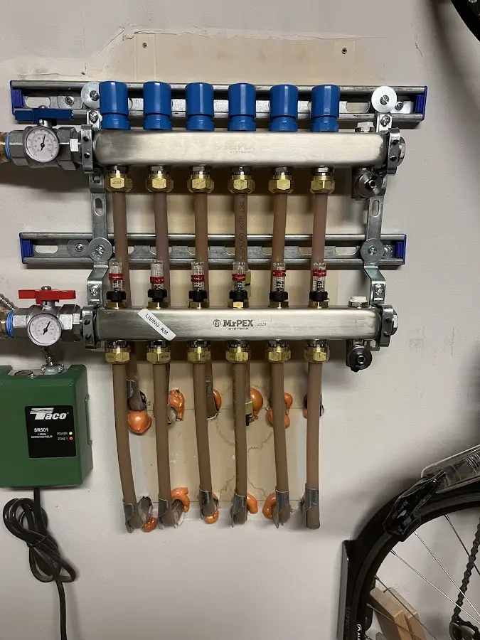 Plumber performing Gas Line Installation at a residential property in Danby